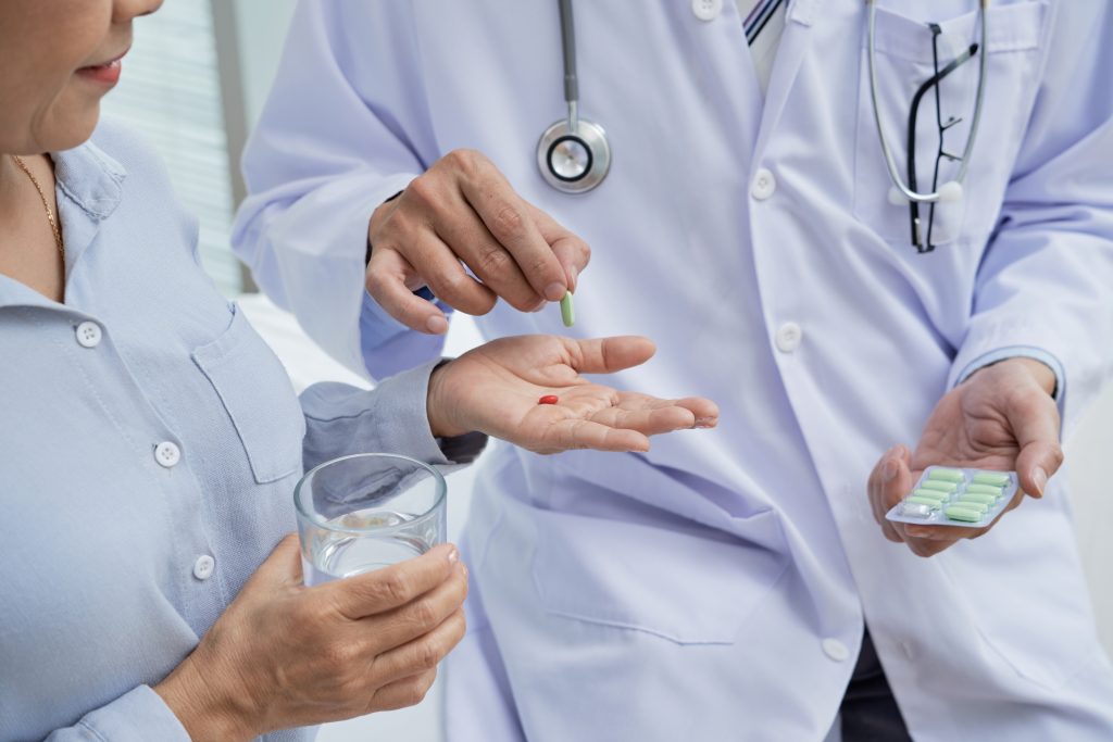 giving pills patient scaled
